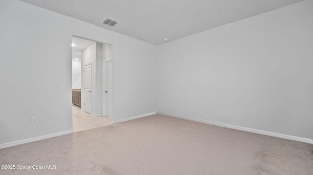 837 Wakaw Ln SW, Palm Bay, FL 32908 - unfurnished room with light colored carpet and baseboards