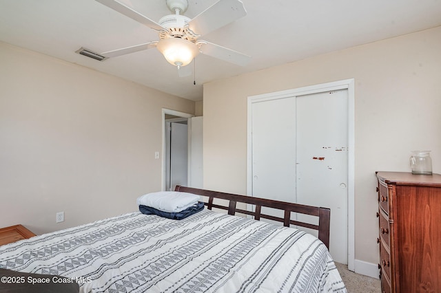 311 3rd St, Merritt Island, FL 32953 - bedroom with baseboards, a closet, and a ceiling fan