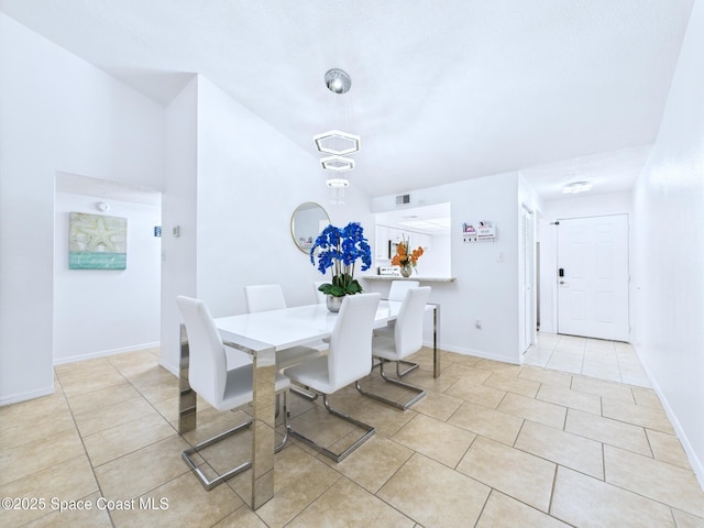 1515 Huntington Ln Unit 924, Rockledge, FL 32955 - dining area featuring light tile patterned floors and baseboards