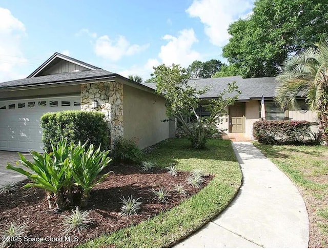 416 Haverlake Cir, Apopka, FL 32712 - ranch-style home featuring stone siding, a garage, stucco siding, driveway, and a front yard