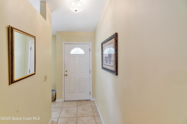 1790 Seeley Cir NW, Palm Bay, FL 32907 - entryway with light tile patterned floors and baseboards