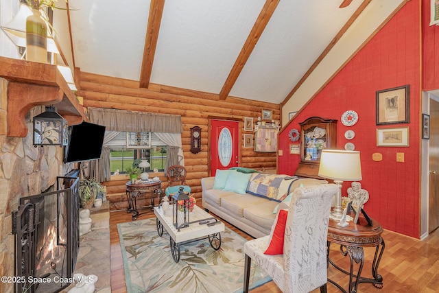 4390 Everglades St, Cocoa, FL 32927 - living room with log walls, wood finished floors, beam ceiling, and high vaulted ceiling