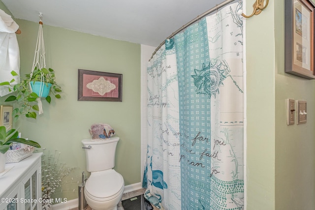 4390 Everglades St, Cocoa, FL 32927 - full bathroom with toilet, baseboards, and curtained shower