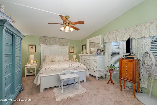 4390 Everglades St, Cocoa, FL 32927 - bedroom featuring vaulted ceiling, light carpet, and ceiling fan