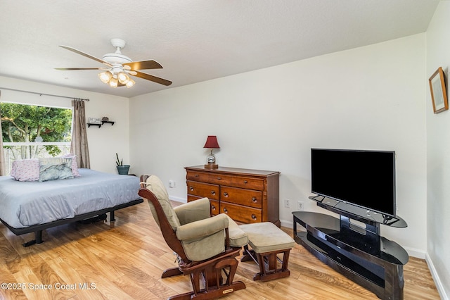 251 District St SE, Palm Bay, FL 32909 - bedroom featuring light wood-style floors, baseboards, and ceiling fan