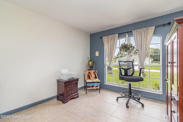 251 District St SE, Palm Bay, FL 32909 - office area with plenty of natural light, baseboards, and light tile patterned flooring