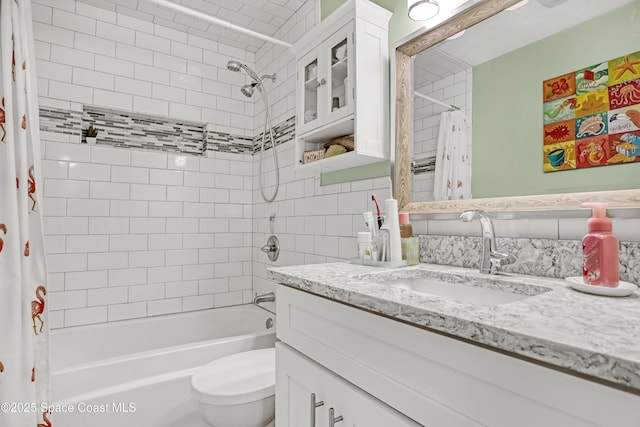 326 Coral Dr, Cape Canaveral, FL 32920 - bathroom featuring vanity, shower / tub combo with curtain, and toilet