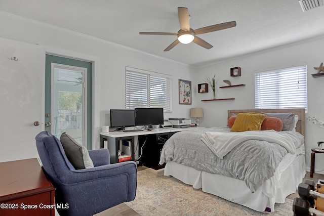 326 Coral Dr, Cape Canaveral, FL 32920 - bedroom featuring multiple windows, crown molding, ceiling fan, light wood-type flooring, and a desk