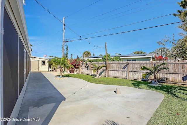 326 Coral Dr, Cape Canaveral, FL 32920 - view of patio featuring an outbuilding