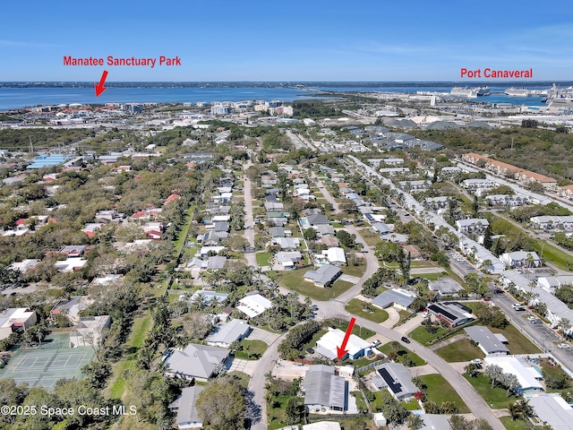 326 Coral Dr, Cape Canaveral, FL 32920 - aerial view of property and surrounding area featuring a nearby body of water and nearby suburban area