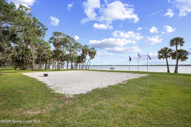 243 Forecast Ln Unit 4-21, Rockledge, FL 32955 - view of community with a water view, volleyball court, and a yard