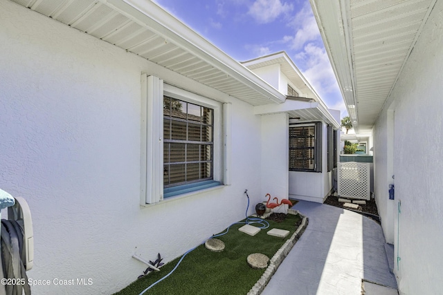 290 Paradise Blvd Unit 61, Indialantic, FL 32903 - property entrance featuring stucco siding