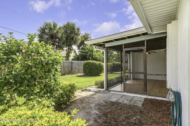 290 Paradise Blvd Unit 61, Indialantic, FL 32903 - view of yard featuring a sunroom