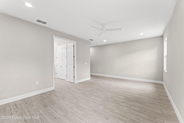 1427 Damon Rd SE, Palm Bay, FL 32909 - spare room with ceiling fan, baseboards, light wood-style flooring, and recessed lighting