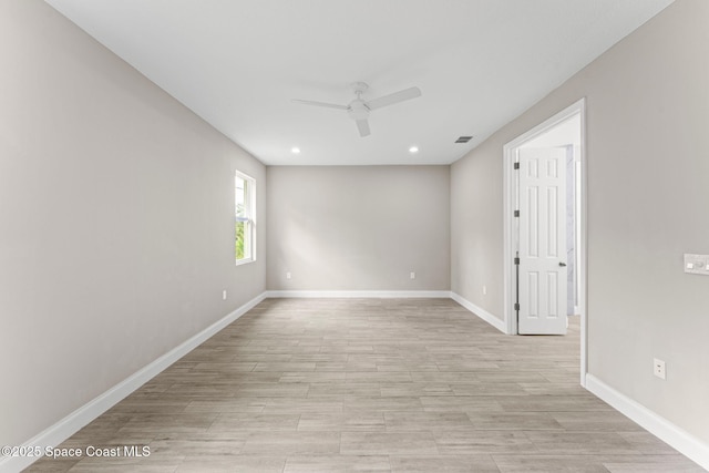 1427 Damon Rd SE, Palm Bay, FL 32909 - empty room featuring ceiling fan, light wood-style floors, baseboards, and recessed lighting