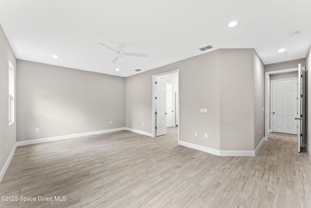 1427 Damon Rd SE, Palm Bay, FL 32909 - spare room featuring ceiling fan, light wood-type flooring, baseboards, and recessed lighting