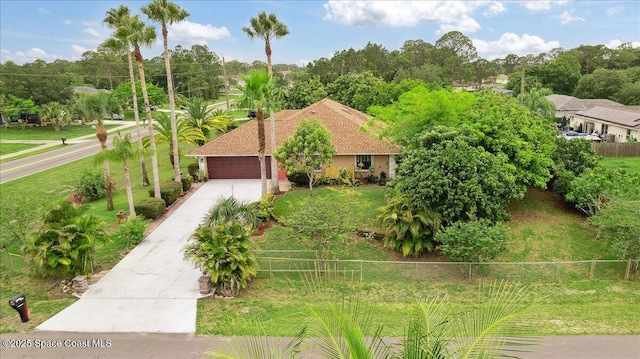 1510 Jupiter Blvd NW, Palm Bay, FL 32907 - view of front of home featuring driveway and an attached garage