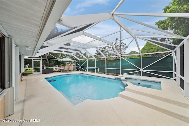 1510 Jupiter Blvd NW, Palm Bay, FL 32907 - view of pool with a patio, a pool with connected hot tub, and glass enclosure