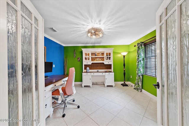 1510 Jupiter Blvd NW, Palm Bay, FL 32907 - office featuring baseboards, light tile patterned floors, crown molding, and built in desk