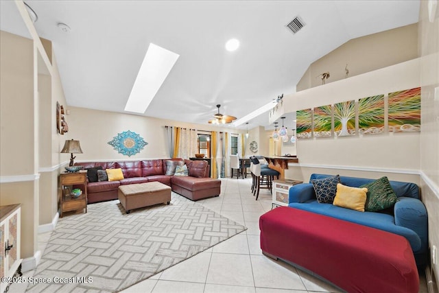 1510 Jupiter Blvd NW, Palm Bay, FL 32907 - living area featuring lofted ceiling, a skylight, ceiling fan, and baseboards