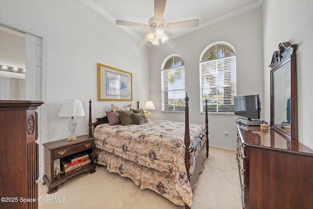 2770 Grand Isle Way SW, Vero Beach, FL 32968 - bedroom with light colored carpet, ornamental molding, and a ceiling fan