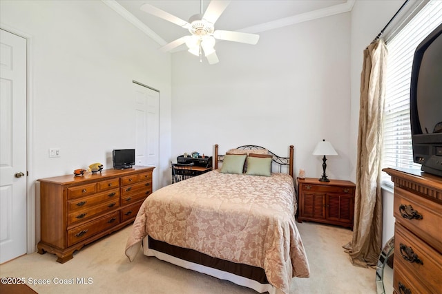 2770 Grand Isle Way SW, Vero Beach, FL 32968 - bedroom featuring light carpet, ornamental molding, and a ceiling fan
