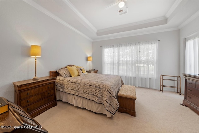 2770 Grand Isle Way SW, Vero Beach, FL 32968 - bedroom with a raised ceiling, crown molding, light colored carpet, and a ceiling fan