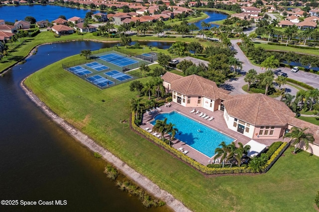 2770 Grand Isle Way SW, Vero Beach, FL 32968 - aerial perspective of suburban area featuring a large body of water and a pool area