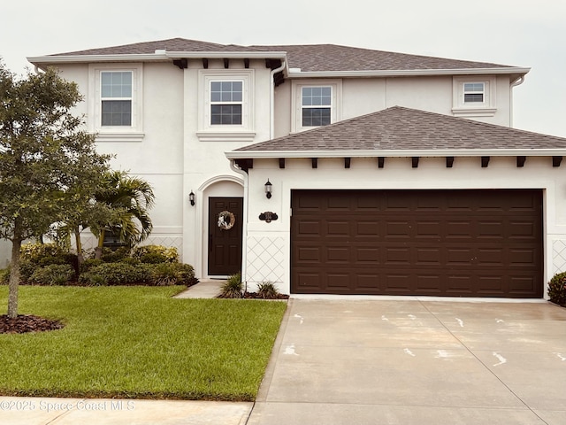 556 Kylar Dr NW, Palm Bay, FL 32907 - view of front of home with a front lawn, driveway, and stucco siding