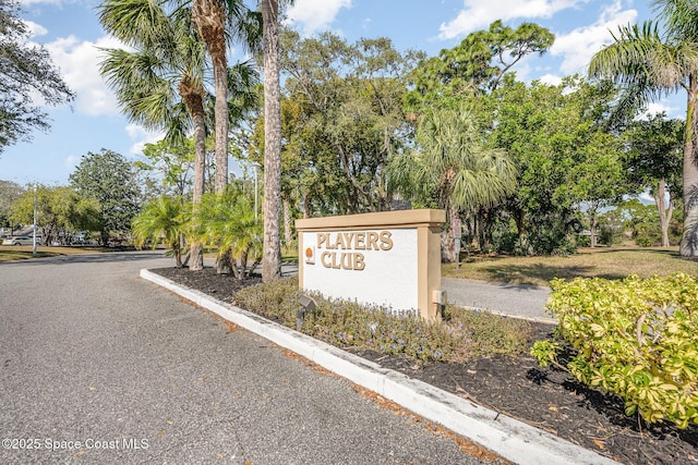 714 Players Ct, Melbourne, FL 32940 - community / neighborhood sign featuring view of scattered trees