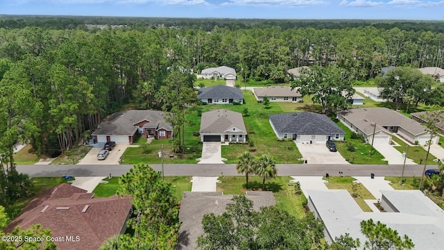 15 Ponderosa Ln, Palm Coast, FL 32164 - aerial overview of property's location featuring a forest and nearby suburban area