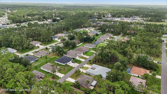 15 Ponderosa Ln, Palm Coast, FL 32164 - aerial view of property's location featuring a heavily wooded area and nearby suburban area