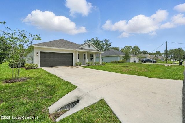 15 Ponderosa Ln, Palm Coast, FL 32164 - view of front facade featuring concrete driveway, a front lawn, an attached garage, and stucco siding