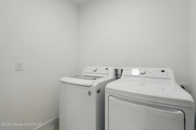 15 Ponderosa Ln, Palm Coast, FL 32164 - washroom with washer and clothes dryer