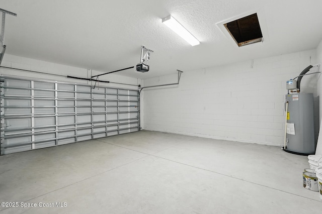 15 Ponderosa Ln, Palm Coast, FL 32164 - garage with water heater, a garage door opener, and concrete block wall