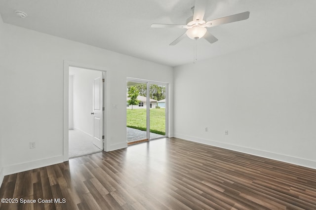 15 Ponderosa Ln, Palm Coast, FL 32164 - empty room featuring a ceiling fan, wood finished floors, a smoke detector, and baseboards