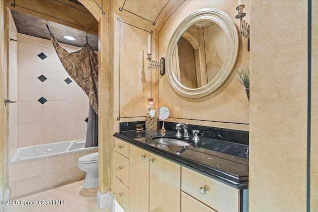 206 Islandia Ct Unit U-206, Satellite Beach, FL 32937 - bathroom with tile patterned flooring, toilet, tiled shower / bath, and vanity