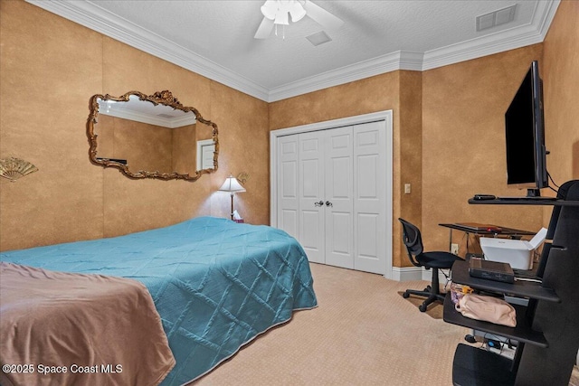206 Islandia Ct Unit U-206, Satellite Beach, FL 32937 - bedroom featuring carpet, a closet, ornamental molding, and a ceiling fan