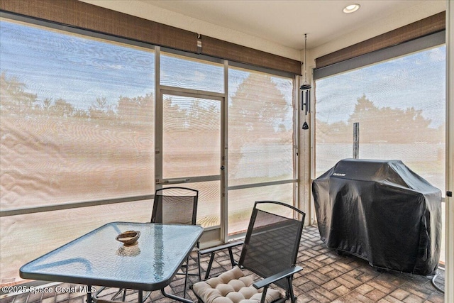 206 Islandia Ct Unit U-206, Satellite Beach, FL 32937 - sunroom / solarium featuring brick patterned flooring and recessed lighting