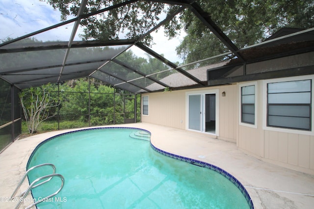 1361 Athens Dr NE, Palm Bay, FL 32907 - outdoor pool featuring a patio and glass enclosure