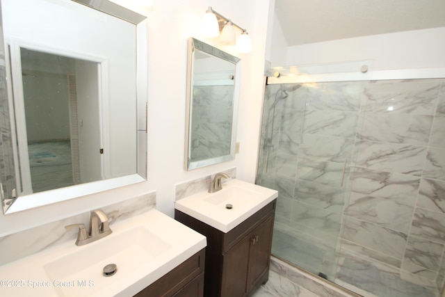 1361 Athens Dr NE, Palm Bay, FL 32907 - bathroom featuring marble finish floors, a marble finish shower, and two vanities