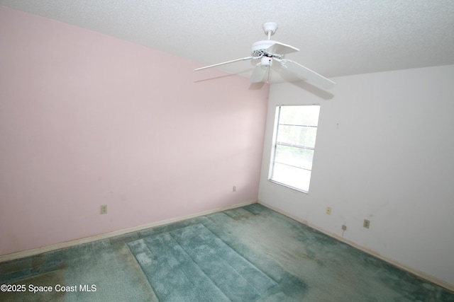 1361 Athens Dr NE, Palm Bay, FL 32907 - spare room with carpet floors, a textured ceiling, a ceiling fan, and baseboards