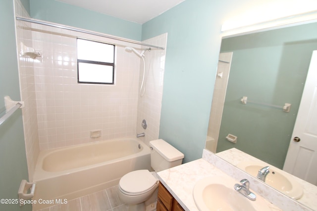 1361 Athens Dr NE, Palm Bay, FL 32907 - full bath with vanity, toilet, and bathtub / shower combination