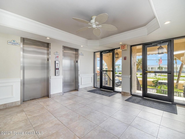 2815 S Atlantic Ave Unit 705, Cocoa Beach, FL 32931 - building lobby featuring a decorative wall, crown molding, recessed lighting, and wainscoting