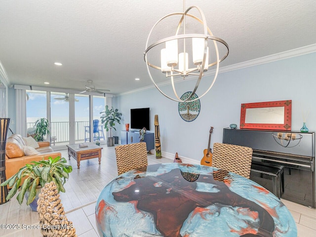2815 S Atlantic Ave Unit 705, Cocoa Beach, FL 32931 - dining room featuring crown molding, a chandelier, a ceiling fan, recessed lighting, and a textured ceiling