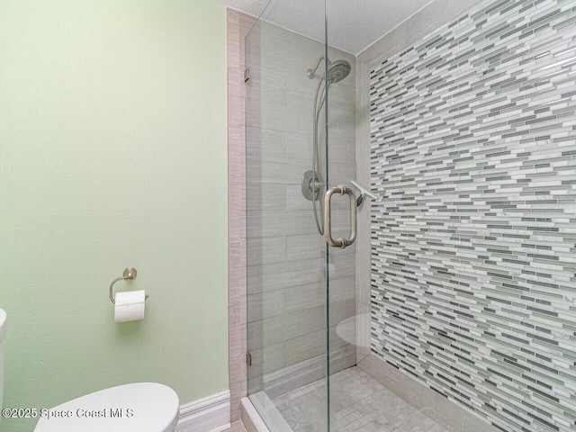 2815 S Atlantic Ave Unit 705, Cocoa Beach, FL 32931 - full bathroom featuring toilet and a stall shower