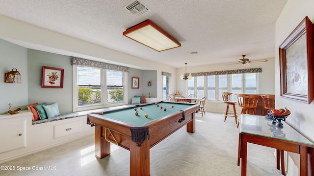 284 Andros Ave, Cocoa Beach, FL 32931 - recreation room with billiards table, plenty of natural light, light carpet, and a textured ceiling