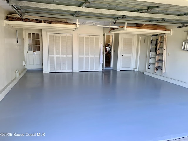 284 Andros Ave, Cocoa Beach, FL 32931 - garage with baseboards