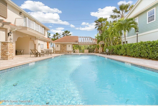 1475 Isabella Dr Unit 101, Melbourne, FL 32935 - community pool featuring a patio