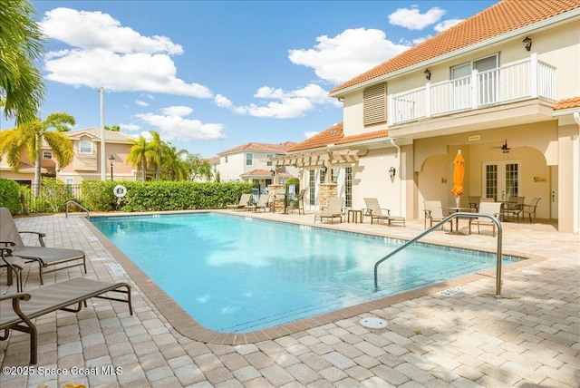 1475 Isabella Dr Unit 101, Melbourne, FL 32935 - community pool featuring a patio area, a pergola, and ceiling fan